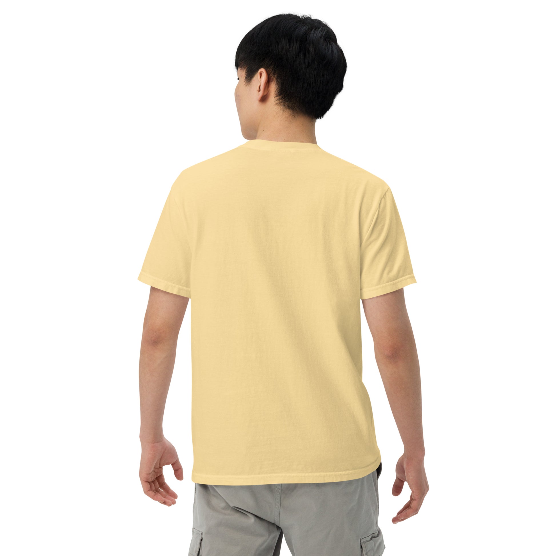 Unisex garment-dyed heavyweight T-shirt in butter color from The Dark Hour Coffee Company, shown from the back.
